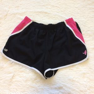 NB running shorts.